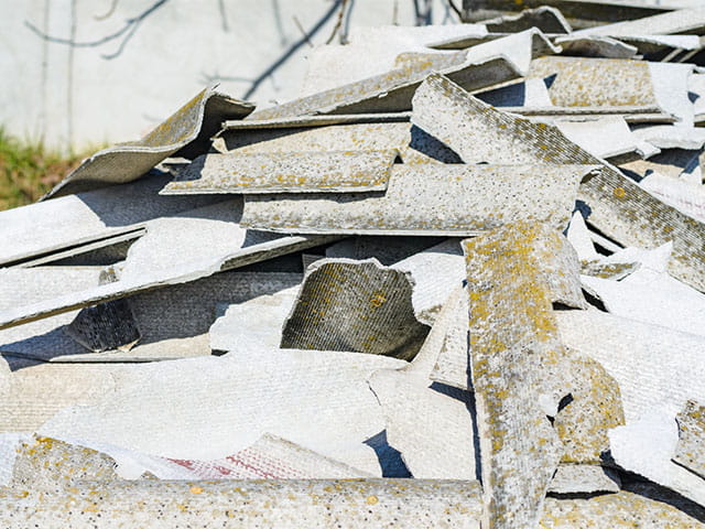 How should I dispose of asbestos waste